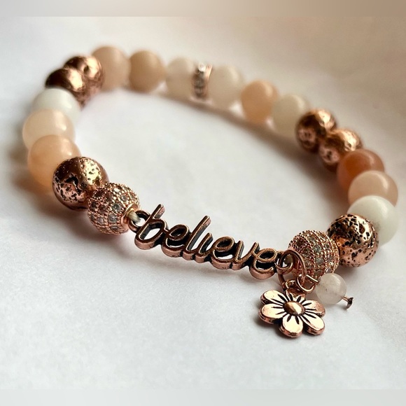 Source Unknown Jewelry - Gemstone elastic believe in color rose gold charm bracelet EUC jewelry